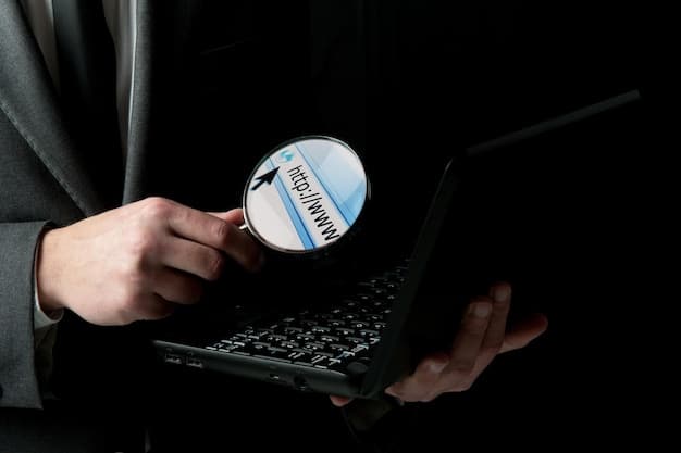 A person's hand holding a magnifying glass over a computer screen, focusing on coupon codes displayed on a website, symbolizing detailed online research and discovery.