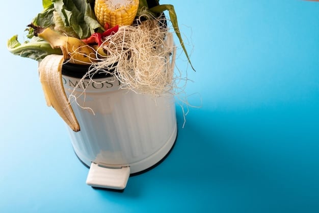 A close-up of a compost bin or a clear container showing vegetable scraps and fruit peels, illustrating the concept of reducing food waste in a kitchen setting.